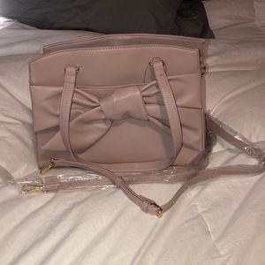 Dusty rose colored large bow satchel